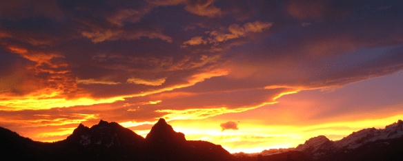 Sunrise behind the Mythen mountains