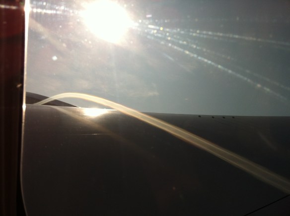 Vapour Trail above Wing