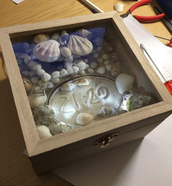 Wooden box with glass window