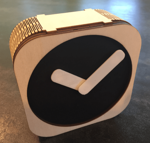 StepperClockBlackFaceWhiteHands